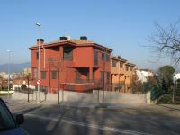 red corner house exterior - urban villa - Ballard & Mensua