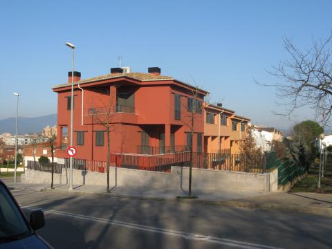 red corner house exterior - urban villa - Ballard & Mensua