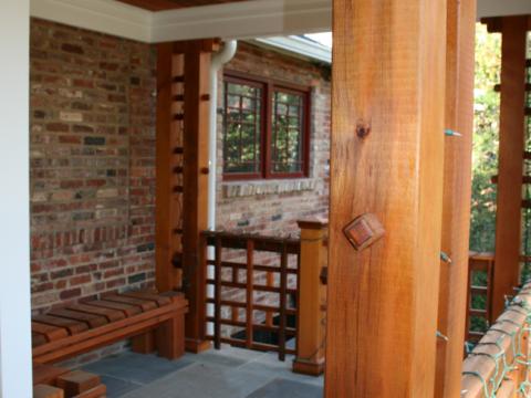 Cedar posts from the front porch of the Ballard's newly renovated home
