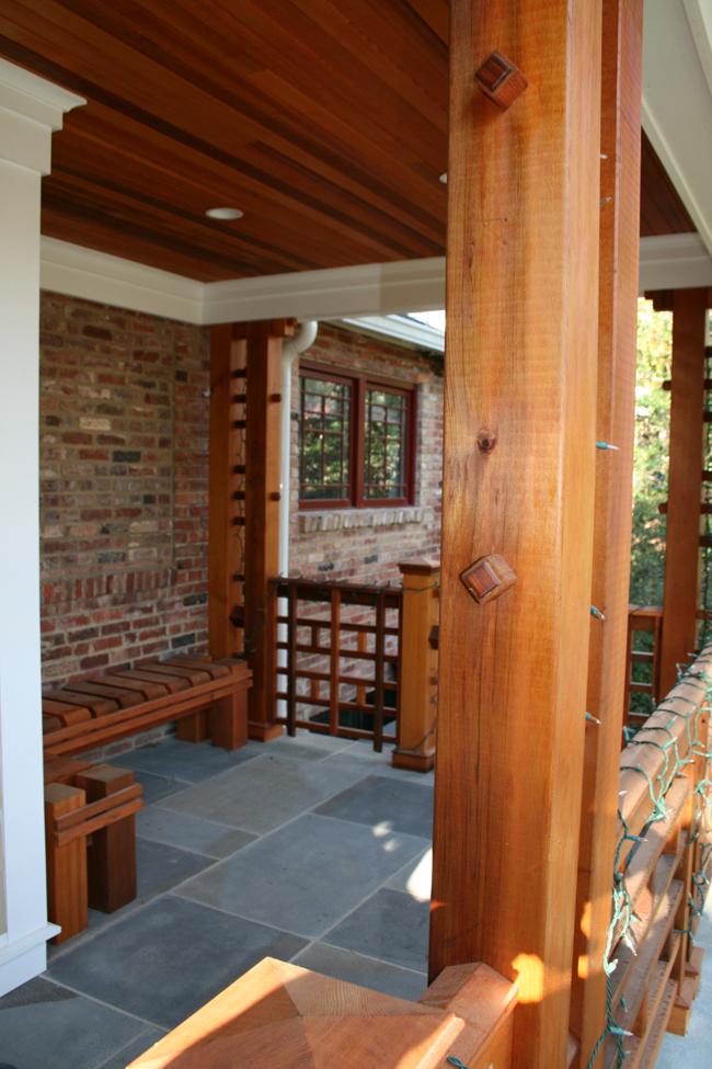Cedar posts from the front porch of the Ballard's newly renovated home